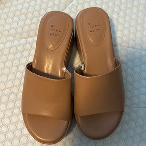 Tan platform slides a new day